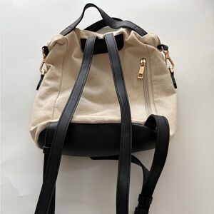 Stylish Cream and Black Women's Backpack by “a new day”.